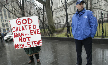 A lone protestor against gay marriage stands outside the Municipal  Building in New York