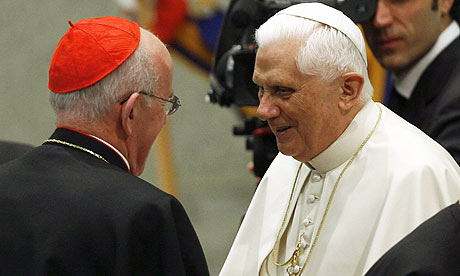 The pope greets Cardinal Sean Brady of Ireland