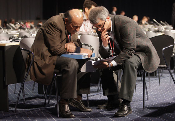 Copenhagen diary: COP15 Delegates talk to each other prior to a plenary session
