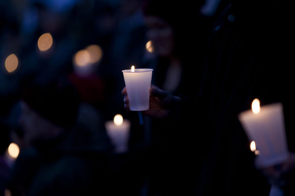 Copenhagen climate summit: A group of demonstrators attend a candlelight vigil