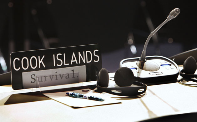 Copenhagen Diary: COP15 The sign 'survival' is placed on delegate table of the Cook Islands