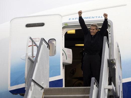 Dreamliner 787: Boeing 787 Chief Pilot Mike Carriker celebrates after the inaugural flight
