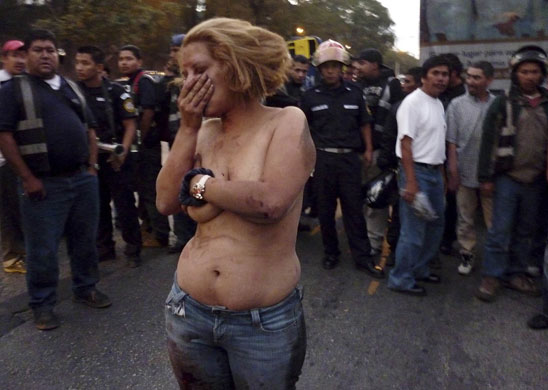 24 hours: A woman during an attempted lynching in Guatemala City