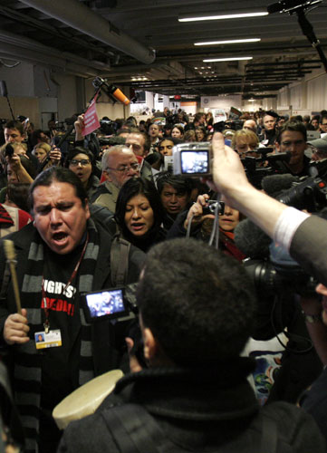 COP15 Reclaim Power: NGO delegates march inside the Bella Center in Copenhagen