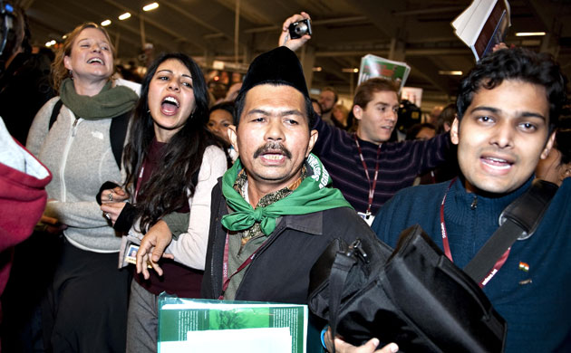 COP15 Reclaim Power: NGO delegates march inside the Bella Center in Copenhagen