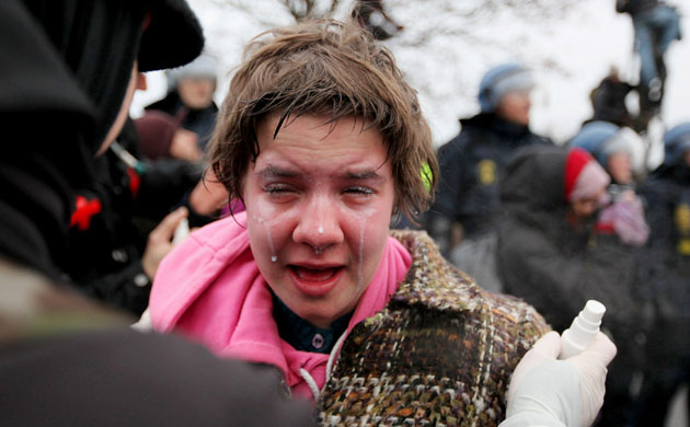 COP15 Reclaim power: COP15 A demonstrator receives help 