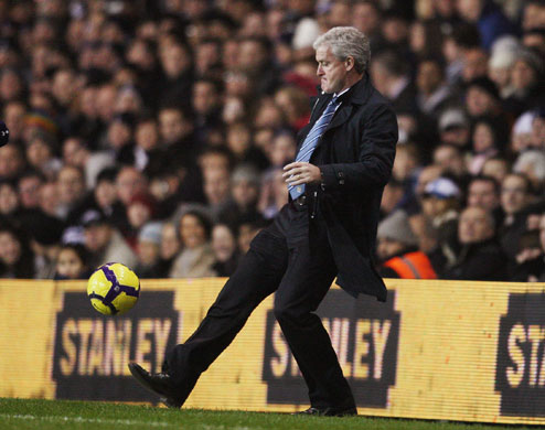 wednesday prem: Mark Hughes controls the ball