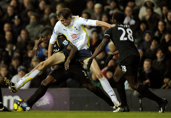 wednesday prem: Peter Crouch battles for the ball with Micah Richards