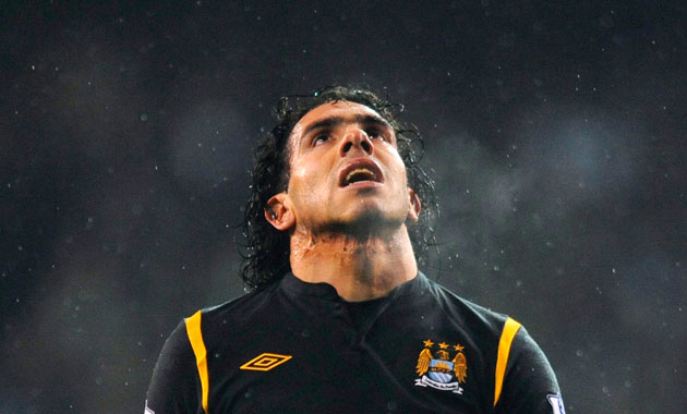 Prem Round up : Manchester City's Tevez reacts after missing a shot against Tottenham