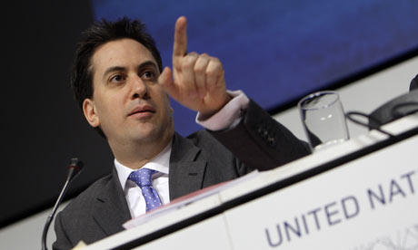 Ed Miliband gestures during a press briefing at the UN climate summit in Copenhagen