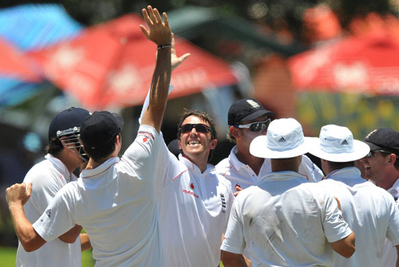 South Africa v England : Swann celebrates taking the wicket of Duminy
