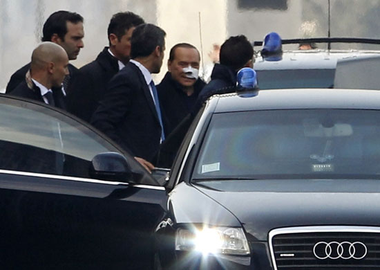 berlusconi: Berlusconi leaves the San Raffaele hospital in Milan
