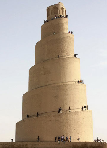 24 hours: Local residents visit the Spiral Minaret of the Great Mosque in Samarra