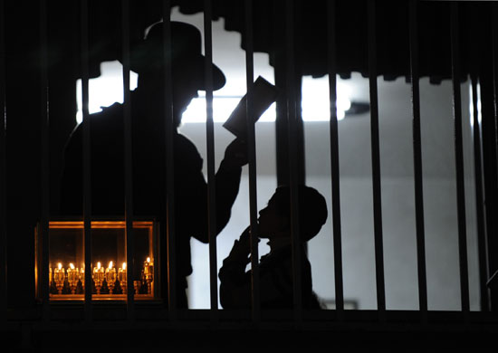 24 hours: Ultra-Orthodox Jews light a Menorah for Hanukkah in Ashdod