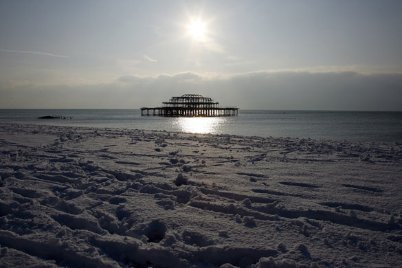 Snow in the UK: Snow covers the West Pier on Brighton beach