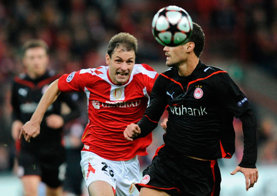 Transfer targets: Olympiacos's Georgios Galitsios (R) figh