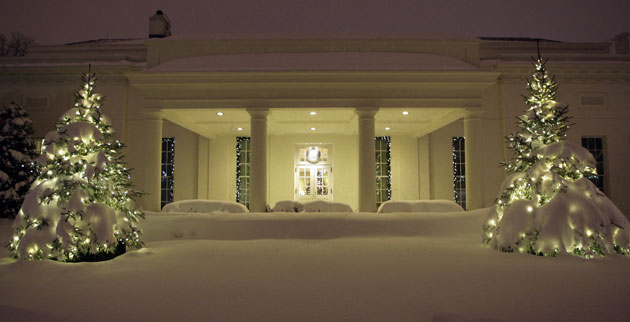 Snow around the world: Washington DC, US: Snow covers the Christmas trees at the White House