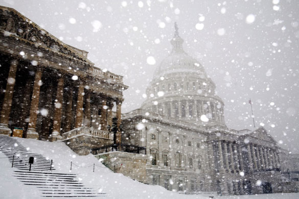 Snow around the world: Washington DC, US: The US Capitol is nearly obscured as heavy snow falls