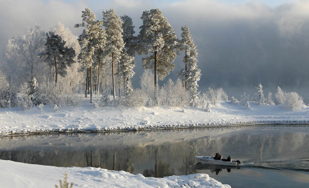24 hours in pictures: Krasnoyarsk, Siberia: A river taxi sails along the Yenisei River