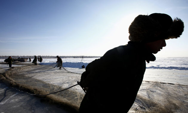 Chinese fishermen: Winter Fishing Season On The Chagan Lake