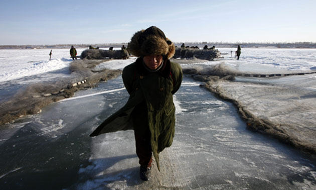 Chinese fishermen: Winter Fishing Season On The Chagan Lake