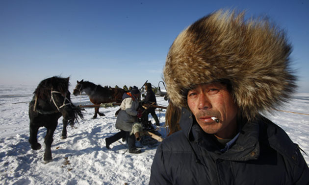 Chinese fishermen: Winter Fishing Season On The Chagan Lake