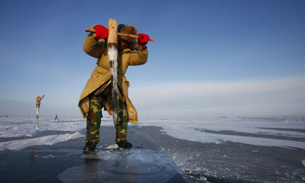 Chinese fishermen: Winter Fishing Season On The Chagan Lake