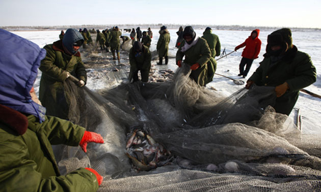 Chinese fishermen: Winter Fishing Season On The Chagan Lake