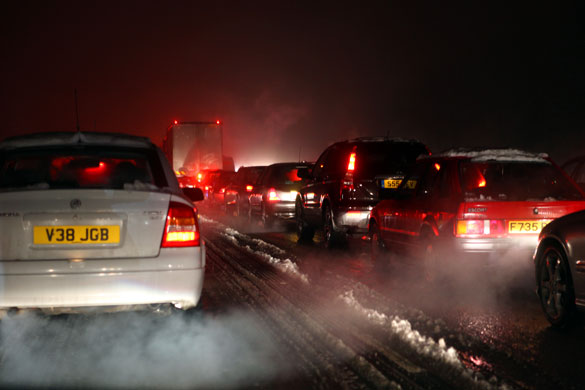 travel chaos: Traffic sits on a snow covered M3 motorway