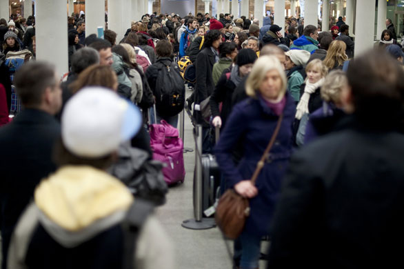 Travel chaos: Eurostar passengers queue for departures at Kings Cross St Pancras