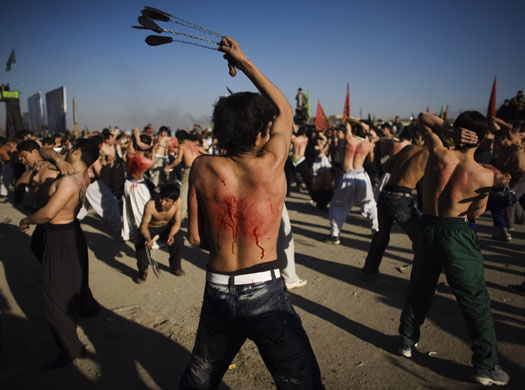 24 hours in pictures: Kabul, Afghanistan: Shiites beat themselves during Muharram