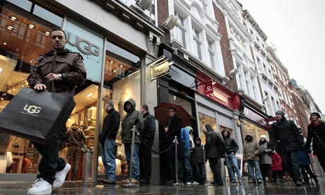 Last-minute Christmas shoppers in Covent Garden London