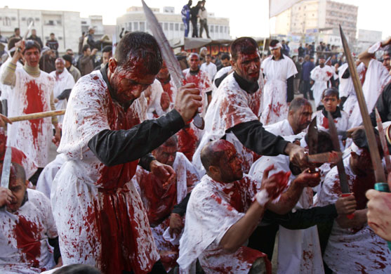 24 hours in pictures: Basra, Iraq: Shiite Muslim worshippers