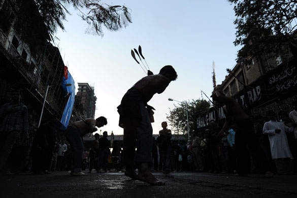 Ashura processions: Indian Shiite Muslims flay themselves with knives during Ashura