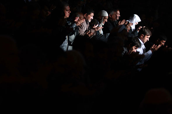 Ashura processions: Iraqi Shiite Muslims pray at a mosque to mark Ashura 