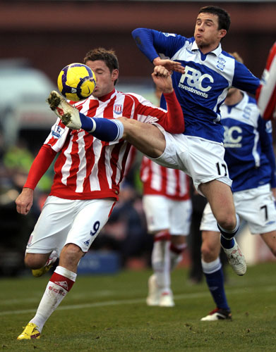 Premier League: Birmingham City's Barry Ferguson and  Stoke City's James Beattie 