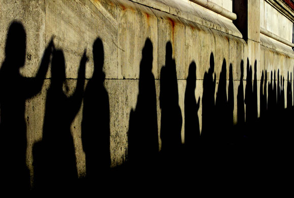 2002-03: People queue to see the Queen Mother lying in state at Westminster Hall