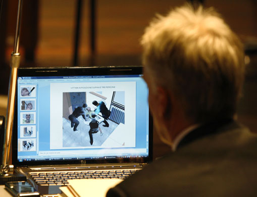 Meredith Kercher trial: Amanda Knox's lawyer Carlo Dalla Vedova watches a computer rendering