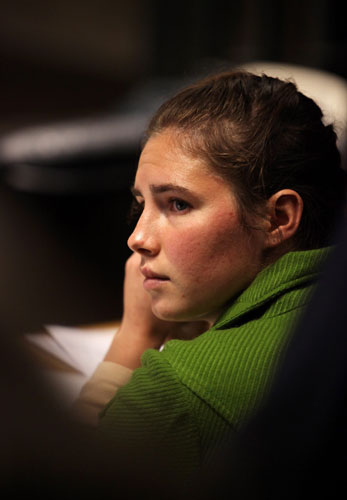 Meredith Kercher trial: Defendant Amanda Knox looks on during a break in the trial in Perugia