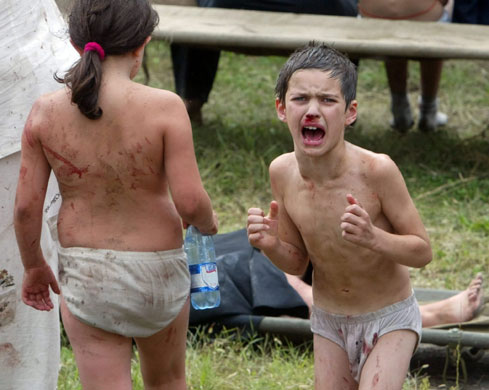 Pictures of the Decade: 11 December 2004: Freed hostages outside a school in Beslan