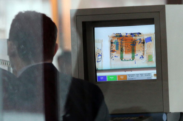 Airport security: Berlin, Germany:  An x-ray machine at a security check at Tegel Airport