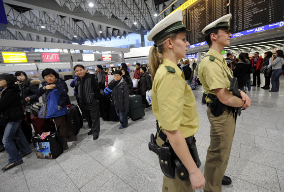 Airport security: Frankfurt/Main, Germany: Police officers patrol through the airport