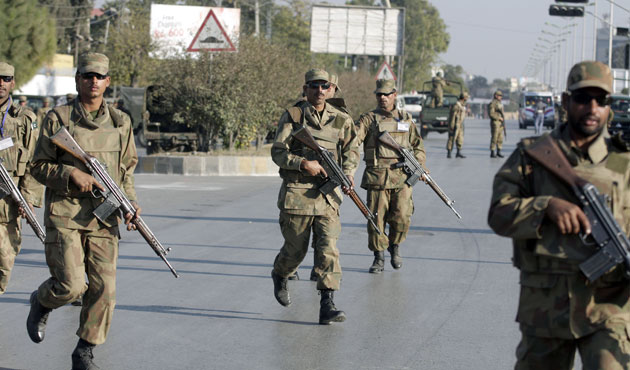Rawalpindi blasts : Pakistan's Army troops take position near the site of a suicide attack