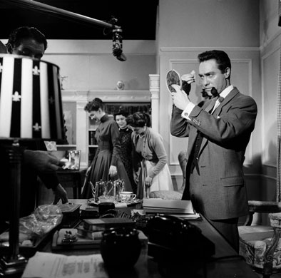 Richard Todd: 1956: Richard Todd applying his own make up  'Portrait of a Star'