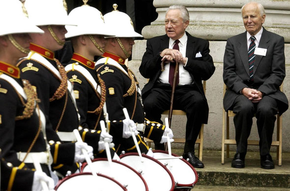 Richard Todd: Actor and D-Day veteren Richard Todd watching a Royal Marine band