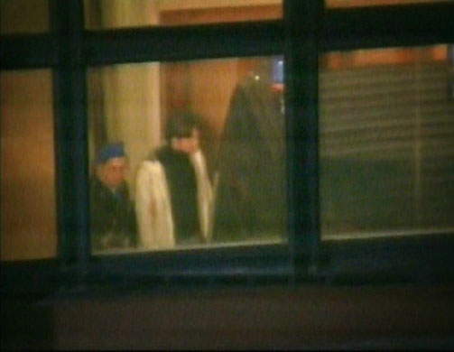 Kercher Verdict: Raffaele Sollecito is led to a vehicle after the guilty verdicts