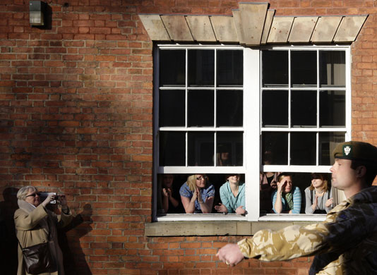 24 Hours: Woman applaud soldiers on their return from Afghanistan in Derby