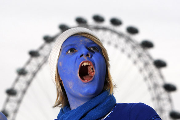 Wave climate change demo: A demonstrator protests during a climate change march in London