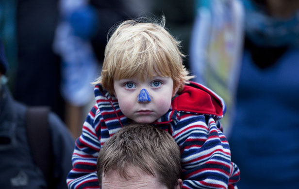 Wave climate change demo: A child takes part in The Wave climate change march