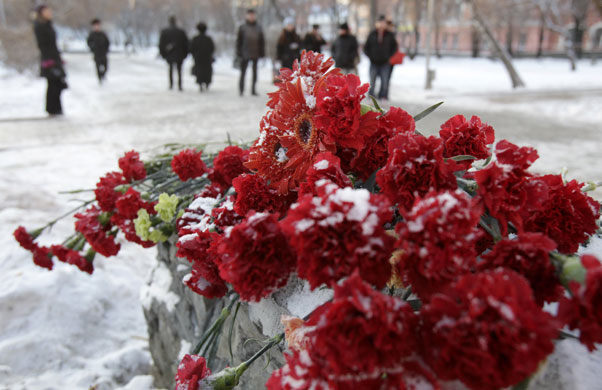 24 hours: Perm, Russia: Flowers are placed outside the Lame Horse nightclub